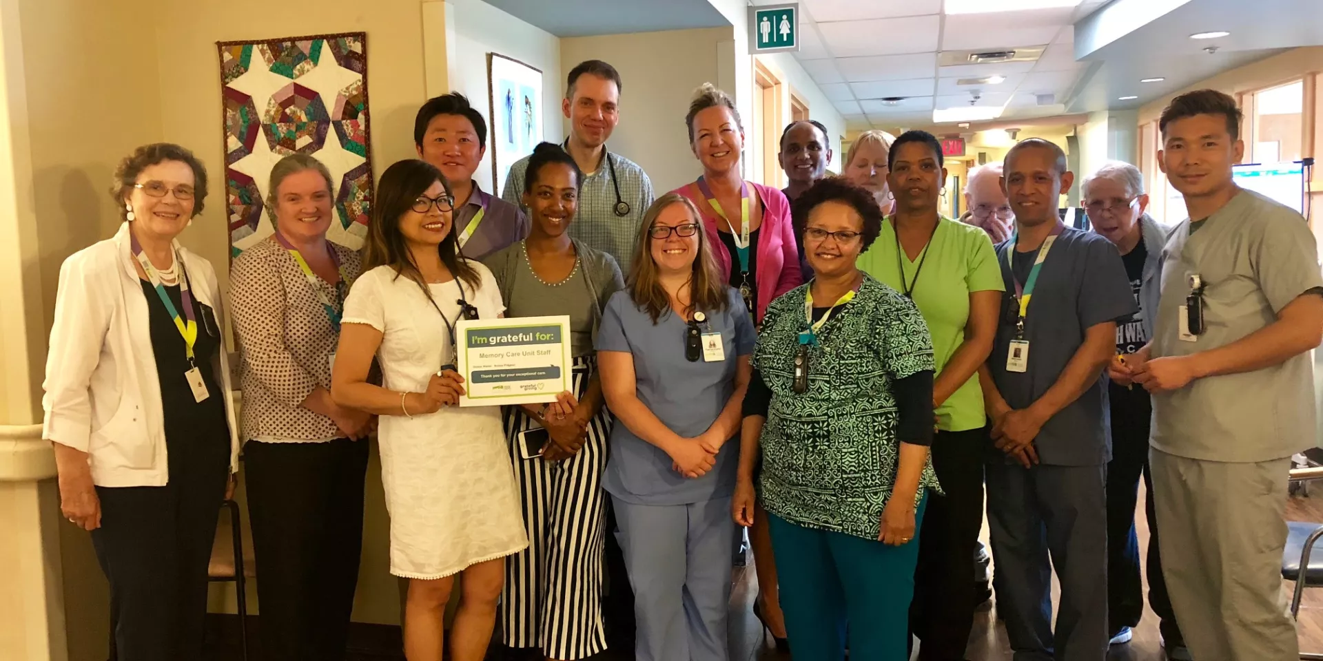The Memory Care Unit team at Michael Garron Hospital accepting their Grateful Giving recognition The Memory Care Unit team at Michael Garron Hospital accepting their Grateful Giving recognition