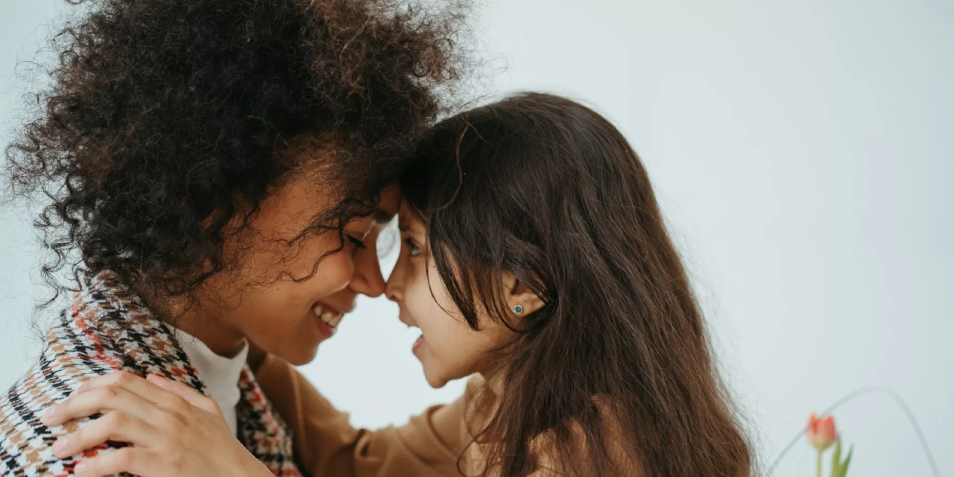 Recovering from burnout: three self-care tips for after the hustle Woman and child smiling