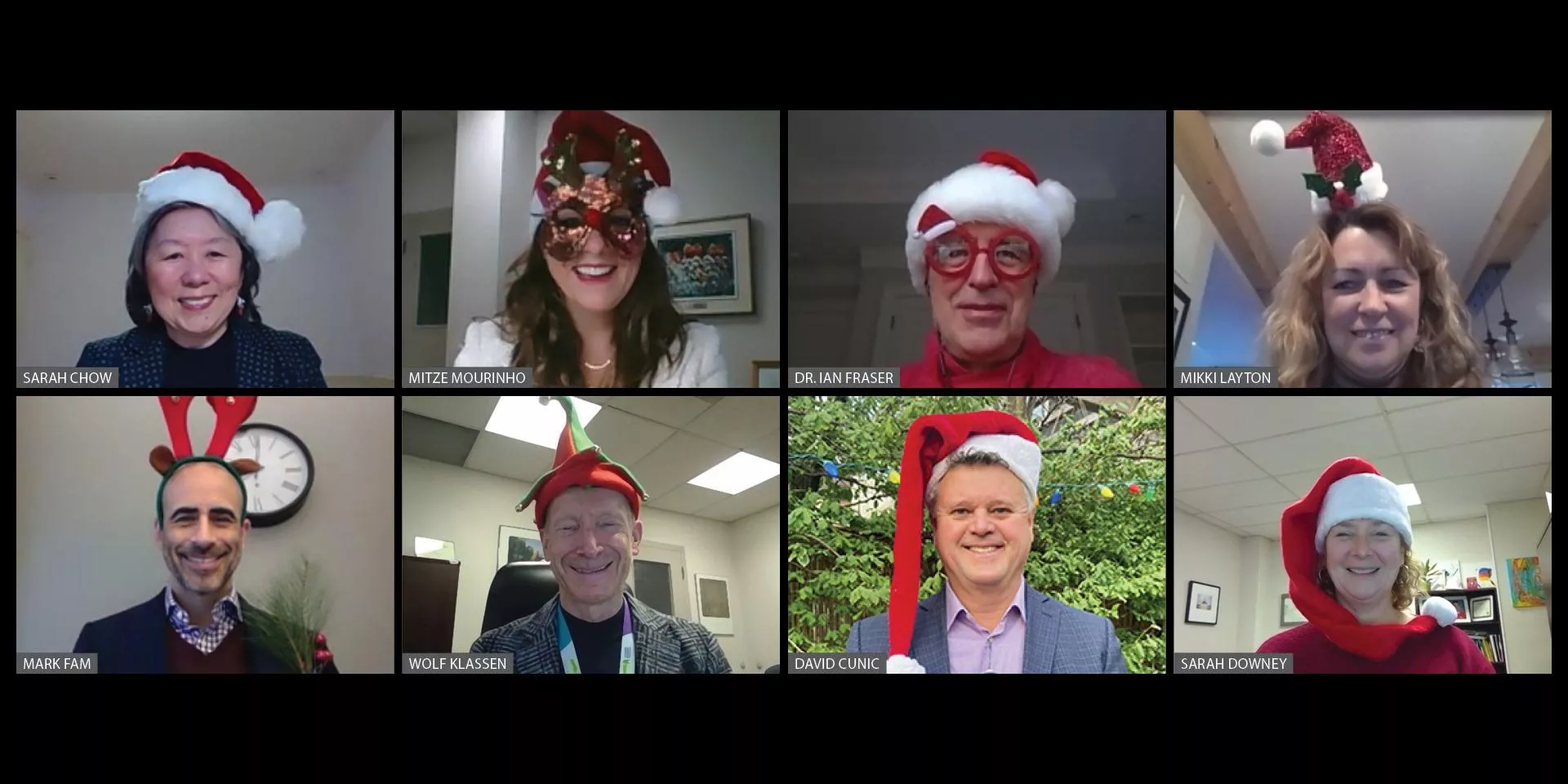 Executive team  executive team all wearing holiday hats