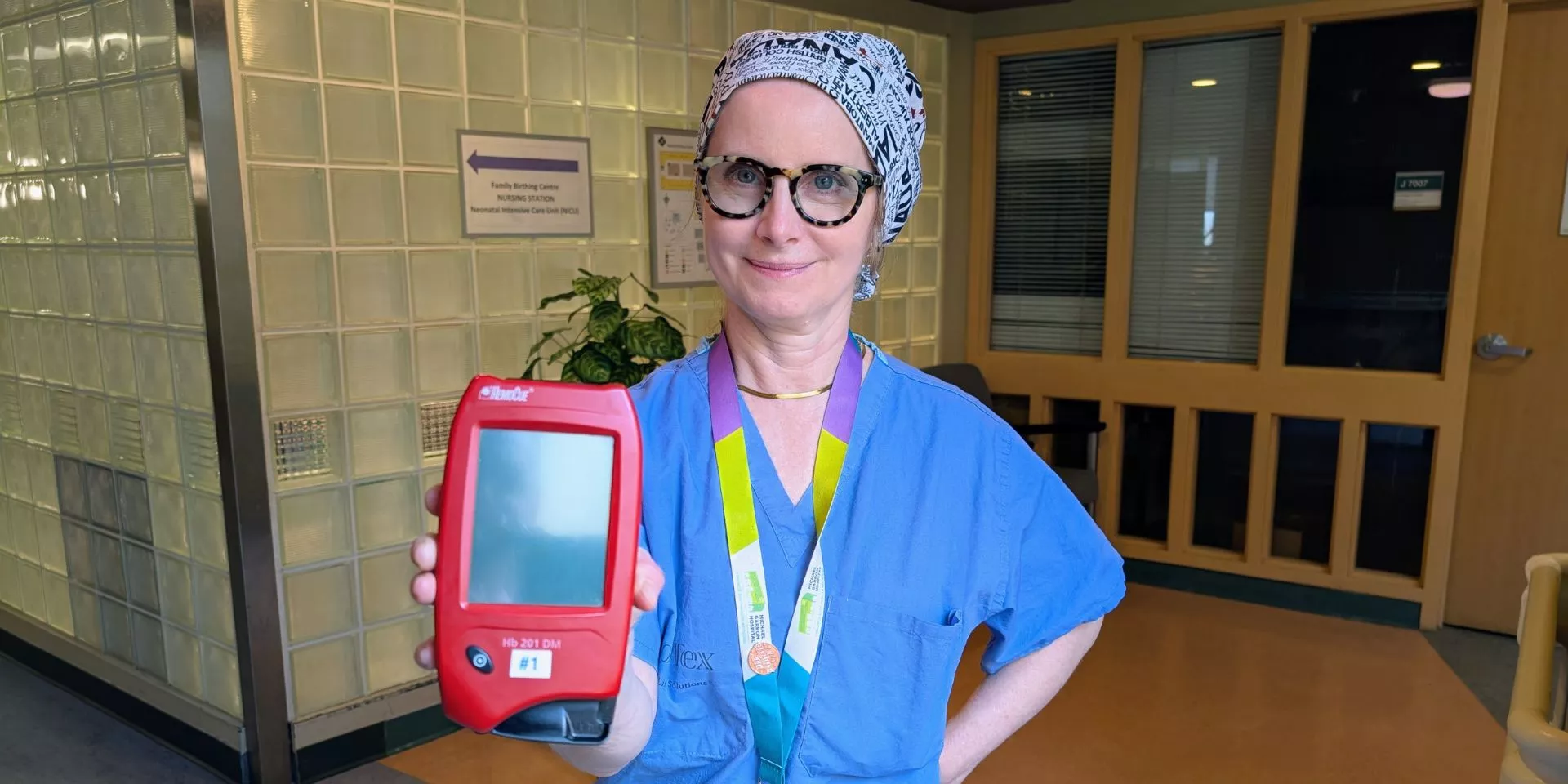Dr. Elin Raymond, Chief of Obstetrics and Gynaecology and Medical Co-Director of Maternal, Newborn and Child Services, holds a red, palm-sized, HemoCue machine. It allows fast and accurate assessment of blood loss. Dr. Elin Raymond, Chief of Obstetrics and Gynaecology and Medical Co-Director of Maternal, Newborn and Child Services, holds a red, palm-sized, HemoCue machine. It allows fast and accurate assessment of blood loss.