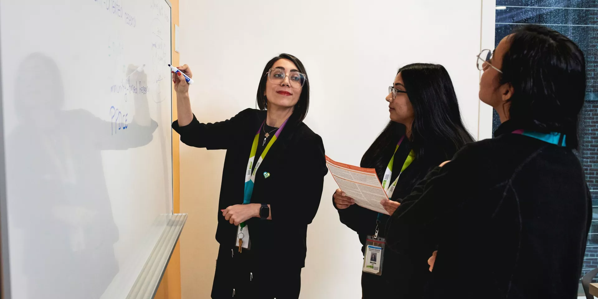 Sara Shearkhani, PhD, Evaluation & Equity Scientist with Michael Garron Hospital and East Toronto Health Partners, collaborates with her team. Sara Shearkhani, PhD, Evaluation & Equity Scientist with Michael Garron Hospital and East Toronto Health Partners, collaborates with her team.