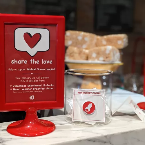 Donation sign and goods at Red Rocket Coffee Donation sign and goods at Red Rocket Coffee