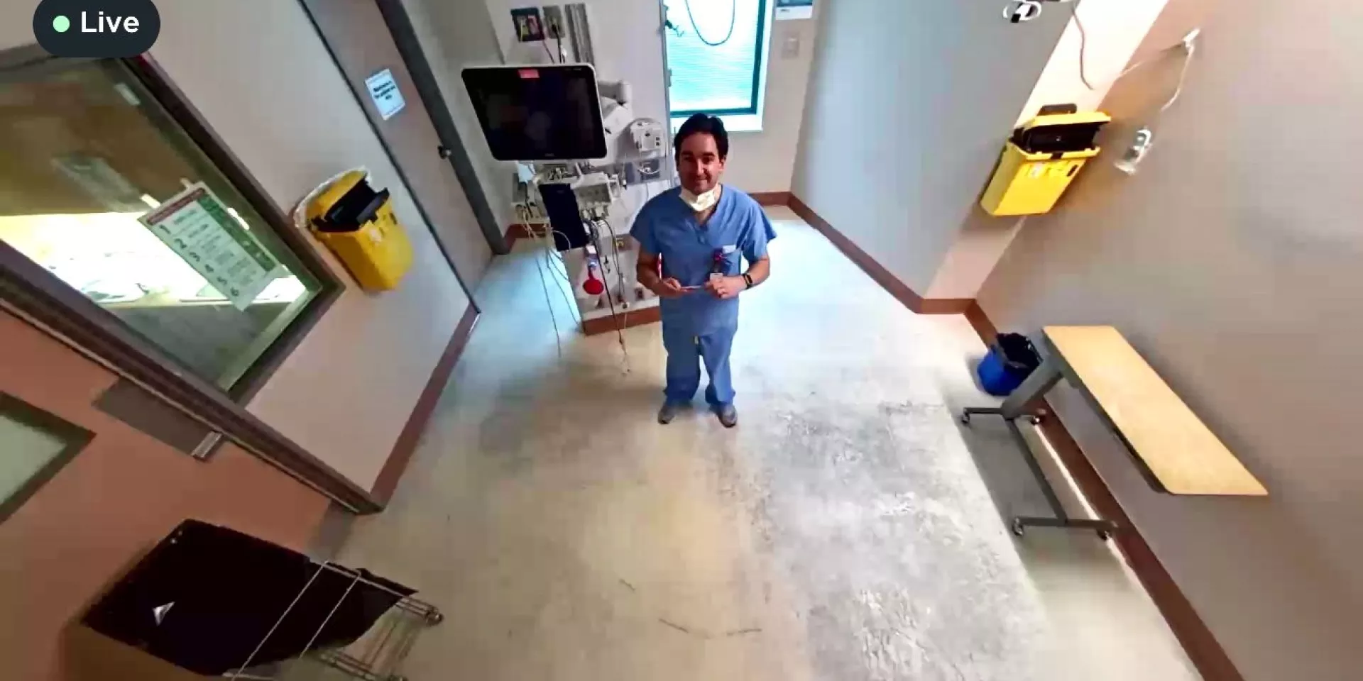 Dr. Patrick Darragh  physician in room looking up at camera