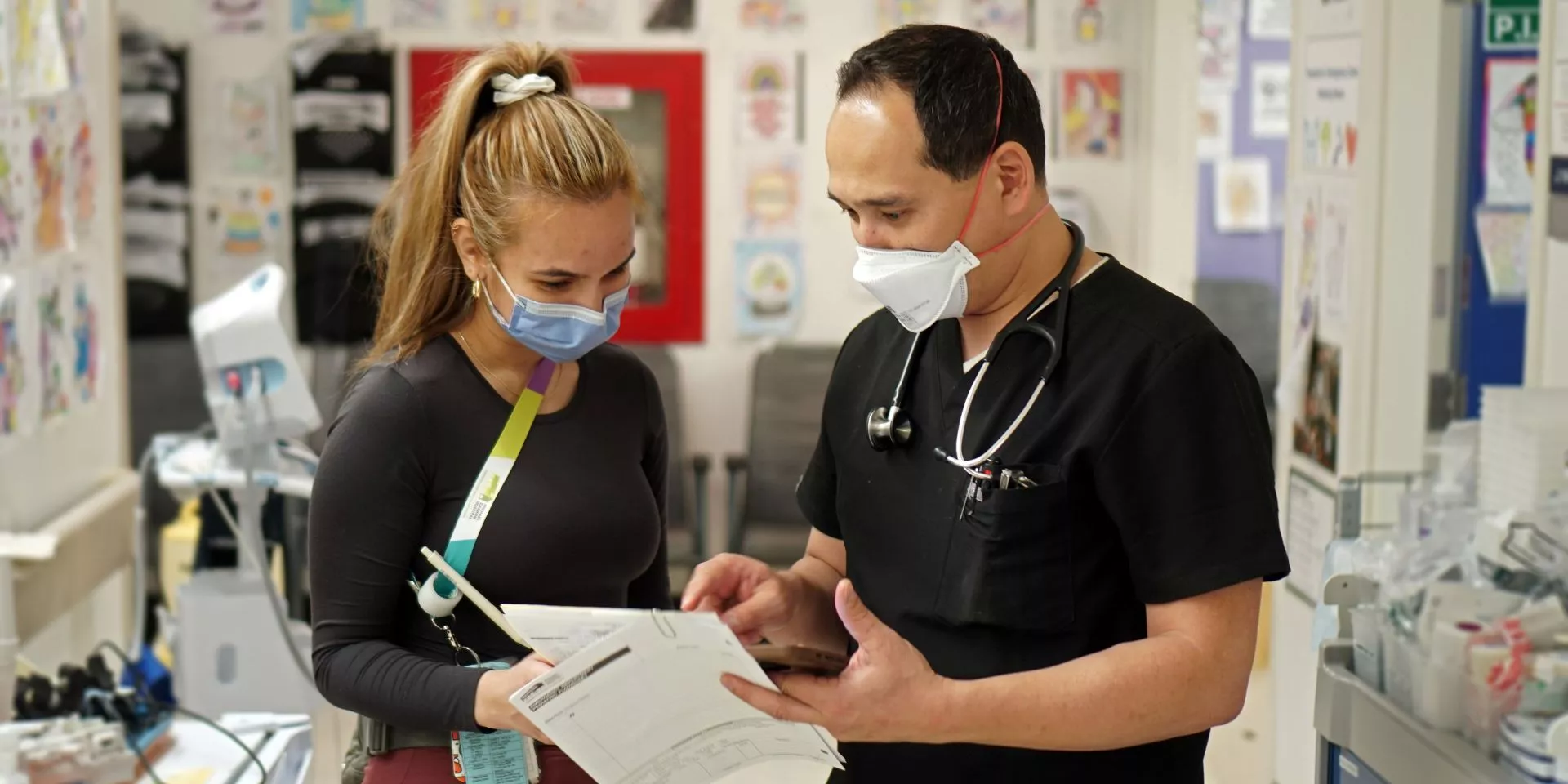 Dr. Kyle Vojdani, Chief and Medical Director of the Stavro Emergency Department, consults with Jessica Lo Russo, RPN.