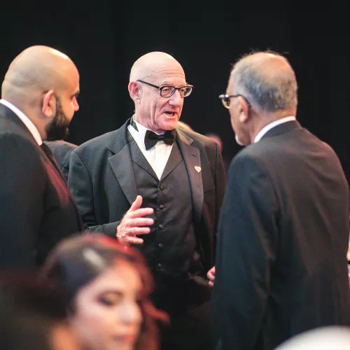 Dr John Abrahamson with the Amarshi family Dr John Abrahamson with the Amarshi family