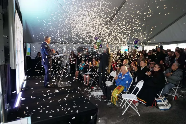 Confetti spraying over the audience at the Heart of the East campaign launch