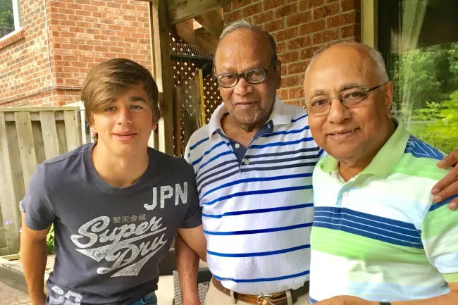 Herman Ferrao with two other people 