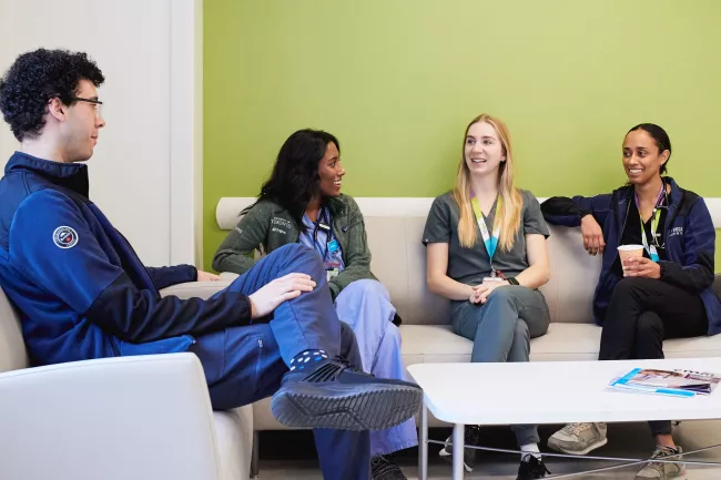 Dr. Maria Leis (second from right) and fellow learners in our Carswell Family Centre for Medical Education. Michael Garron Hospital helps train the next generation of physicians, in partnership with the University of Toronto.